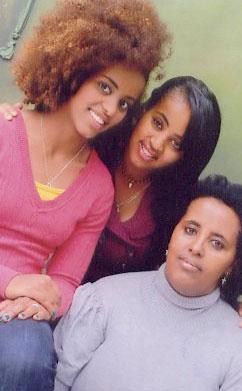 Contributed Photo<br /><strong>Selam (left) with her sister, Tita, and her biological mom, Emebet. </strong>